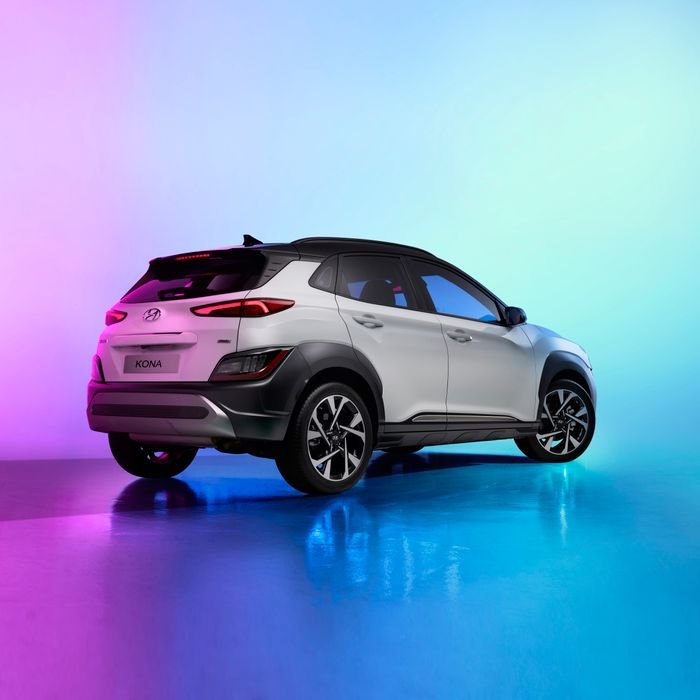 Hyundai Kona SUV showcasing sleek design and vibrant multicolor lighting, perfect for automotive enthusiasts.